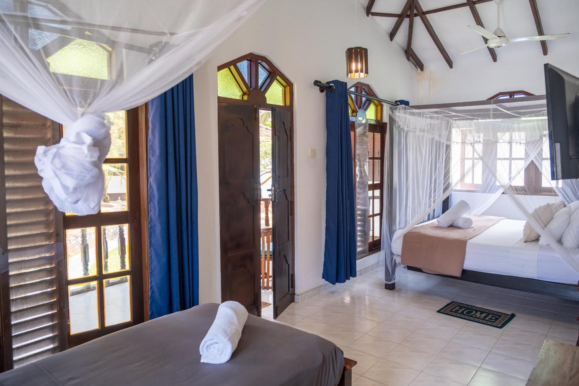 Serenity Beach Cabanas แทนกาลเล ภายนอก รูปภาพ